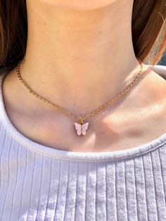 Cute pink butterfly adjustable necklace. Super simple and adorable and looks great with any outfit. Perfect birthday, or holiday gift for a friend, girlfriend, or just for yourself! Dainty Pink Charm Necklace With Delicate Chain, Dainty Pink Charm Necklace With Adjustable Chain, Rose Gold Butterfly Necklace With Adjustable Chain, Casual Clavicle Chain Necklace As Gift, Casual Clavicle Chain Necklace For Gift, Cute Pink Jewelry With Adjustable Chain, Pink Charm Necklace With Clavicle Chain As Gift, Trendy Butterfly Jewelry For Gift, Pink Clavicle Chain Charm Necklace For Gift