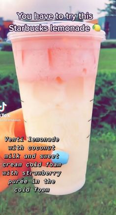 a person holding up a drink in their hand with the caption you have to try this starbucks lemonade