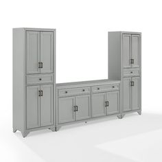 a large gray cabinet with doors and drawers