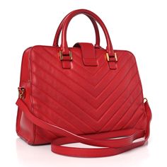 This is an authentic SAINT LAURENT Calfskin Matelasse Chevron Small Monogram Cabas in Lipstick Red. This luxurious tote is in the smaller size in chevron quilted red calfskin leather. The bag features rolled leather top handles, a cross over facing strap with a weighted Saint Laurent emblem and gold hardware. The top zipper opens to a red suede interior with zipper and patch pockets. This is an ideal tote for day or evening with the classic chic style of Saint Laurent! Classic Chic Style, Lipstick Red, Chevron Quilt, Classic Chic, Red Suede, Leather Top, Gold Hardware, Patch Pocket, Chic Style