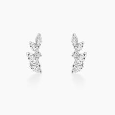 Behold the allure of our Dainty Moissanite Earring—a graceful embodiment of understated elegance. Crafted meticulously in sterling silver, this piece showcases mesmerizing moissanite stones, delicately poised to elevate your style with its subtle yet captivating charm. Embrace sophistication and modern refinement with this exquisitely crafted accessory.