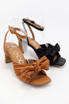 Description Unique Pleated Knot Bow Faux PU Leather Strap and leather heel Square toe 2.75" heel Materials & Care Wipe as Needed Knot Bow, Bow Heels, Spring Tops, Skirts For Sale, Heeled Sandals, Shoe Sale, Bag Straps, Leather Heels, Sweater Hoodie