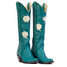 Sexy, tall show-stopper. Get ready to strut yo' stuff in these beauties. This boot features a 17" tall shaft and a 2. 5" tall heel.   Our father loved Western Swing and the velvety sound of Bob Wills and the Texas Playboys - gives us goosebumps every time...  "Moon in all your splendor, known only to my heart Call back my rose, rose of San Antone Lips so sweet and tender, like petals falling apart Speak once again of my love, my own" 100% leather  Wipe with a damp, clean cloth or brush and buff Teal Heels, Dad Jewelry, Boot Companies, Shoe Inserts, Our Father, Western Boots Women, Cowboy Boots Women, Cowboy Boot, Tie Shoes