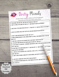 a printable dirty minds game with a pen next to it on a wooden table