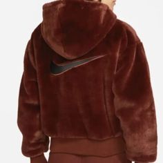 Nike Women's Sportswear Essentials Faux Fur Bronze Jacket Dd5116-273 Size Medium Color: Brown Women's Size Medium Style Code: Dd5116-273 New With Tags. See Pictures For More Details. Feel Free To Ask Us Any Questions. Cozy Sports Outerwear, Nike Cozy Sports Outerwear, Cozy Nike Sports Outerwear, Nike Cozy Winter Outerwear, Sporty Brown Outerwear With Fleece Lining, Winter Sports Brown Outerwear, Nike Brown Outerwear For Winter, Nike Rain Jacket, Nike Fleece Hoodie