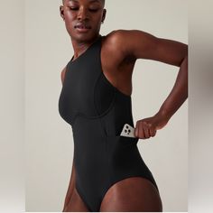 Reposhing This Item I Purchased From @Whysuchadeal. Loved It, But It Was A Little Loose On Me. Questions? Leave A Comment Below! Black Racerback Bodysuit For Swimming, High Stretch Black Racerback Swimwear, Black High Stretch Racerback Swimwear, Sporty Sleeveless Bodysuit For Poolside, Black One-piece Swimwear For Workout, Black Athleisure Sleeveless Swimwear, Sporty Compressive Sleeveless Swimwear, Functional Black Swimwear With Built-in Bra, Black Compressive Functional Swimwear