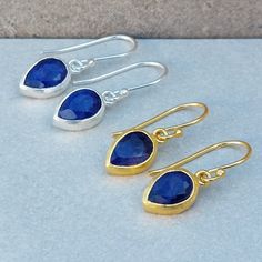 DaniMini Blue Sapphire Gold Earrings 18 CT Gold Vermeil on Sterling Silver GEMSTONE BLUE SAPPHIRE  A simply beautiful everyday earrings with a unique gemstone. Perfect to combine with other jewels from the same collection. Tiny and Dainty hook earrings Soft Brushed Textured Gemstone Length 9mm x 6mm Total length of the earrings including hooks is 3cm. ★GEMSTONE CORUNDUM BLUE SAPPHIRE September birthstone Sapphire have properties of protection, bringing spiritual insight, and good fortune. Note t Teardrop Sapphire Earrings For Gift, Sapphire Teardrop Gemstone Earrings, Sapphire Teardrop Birthstone Earrings, Teardrop Sapphire Jewelry With Matching Earrings, Teardrop Sapphire Faceted Jewelry, Faceted Teardrop Sapphire Jewelry, Faceted Teardrop Earrings For Jewelry Making, Sapphire Teardrop Earrings With Ear Wire, Jewellery Women