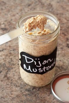 a jar filled with food sitting on top of a counter