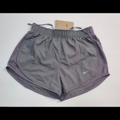 Brand New With Tags Nike Dri-Fit Women’s Running Shorts Size Xs Grey . Style Number Cu8890-067 . Built In Underwear And Hidden Pocket Inside Gray Go-dry Shorts, Poshmark Clothes, Shoes Wishlist, Bday Stuff, Grey Sweat Shorts, Nike Shorts Women, Nike Tempo Shorts, Capri Shorts, Cute Nike Outfits