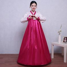 A hanbok is a traditional dress worn in Korea for formal and semi-formal occasions. This clothing style originated during the Joseon dynasty period by the upper class. This affordable high-quality costume dress is great for a Cosplay or multi-cultural event. Available in a wide array of colors! We're sure you'll find the perfect color combination to suit you. Material: Cotton/Polyester Disclaimer:Colors may vary slightly due to monitor display settings.Dresses are manually measured and there may Elegant Fitted White Hanbok, Traditional Spring Wedding Hanbok, Korean Costume, Hanbok Dress, Red Rose Dress, Stage Dance, Black And Pink Dress, Korean Hanbok, Kpop Kdrama