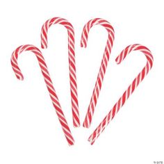 three candy canes on a white background