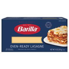 a box of lasagna on a white plate