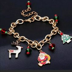 Beautiful Gold Plated Charm Bracelet With Santa, Reindeer And Christmas Tree Colored Charms With Swarovski Crystals It Comes In Velvet Jewelry Pouch And Small Box Ready To Be A Special Gift Party Mode, Christmas Pendant, Christmas Bracelet, Gold Charm Bracelet, Christmas Charms, Tree Pendant, Christmas Jewelry, Charm Gift, Pendant Bracelet