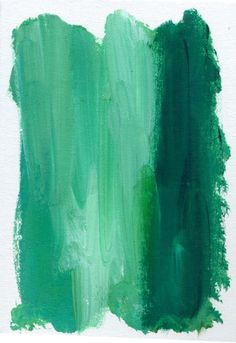 two different shades of green paint on white paper