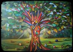 a painting of a colorful tree in the middle of a field with balls around it