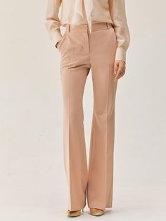 This product features the Vashti bootcut trousers, which are a contemporary update on a classic style. The trousers boast a flattering bootcut silhouette that gently flares from the knee to hem, creating an elongated look. Tailored to perfection, these trousers sit at the natural waist and are designed to offer both comfort and a streamlined appearance. - The bootcut silhouette of these trousers offers a flattering shape that balances proportions and elongates the legs.- Sitting comfortably at the natural waist, they provide a fit that's both secure and stylish.- Tailored construction ensures a polished look, ideal for a professional setting or a sophisticated casual outfit.- These trousers are a versatile staple, easily paired with various tops and shoes for a range of occasions. Elegant Fitted Flares For Workwear, Elegant Fitted Flares For Work, Fitted Formal Wide Leg Flare Pants, Fitted Flare Wide Leg Pants For Formal Occasions, Elegant Flare Dress Pants For Formal Occasions, Elegant Fitted Flare Bottoms, Elegant Tailored Flare Pants, Elegant Tailored Flare Bottoms, Elegant Wide Leg Flares