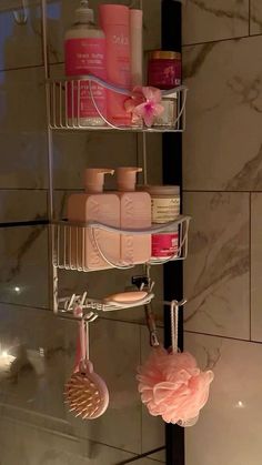 three tiered shower caddy with soap, shampoo and other items