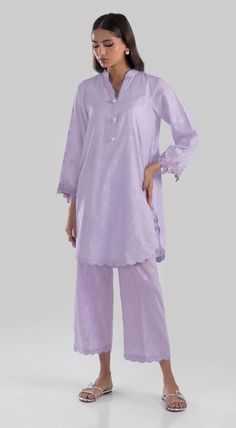 Product Details: Description: Summer simplicity: Lavender hue, cool and chic. Color: Lilac Fabric: Cotton Brochia Cut: Basic Trouser: Cotton Brochia Culotte Elegant Semi-stitched Purple Sets, Elegant Cotton Palazzo Set With Chikankari Embroidery, Designer Purple Chikankari Lawn Suit, Elegant Designer Unstitched Suit For Spring, Elegant Spring Designer Unstitched Suit, Feminine Festive Sets With Chikankari Embroidery, Festive Feminine Sets With Chikankari Embroidery, Elegant Unstitched Summer Suit With Resham Embroidery, Designer Purple Lawn Suit With Chikankari Embroidery