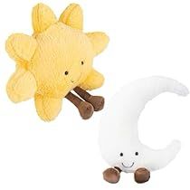 two stuffed animals sitting next to each other in the shape of letters g and c