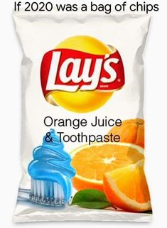 lays orange juice and toothpaste on a white background with an orange slice in the foreground