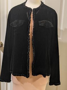 "This soft velvet blazer is in very good vintage condition. Chico Size 2 73% Rayon....27%Silk (Super soft material) Lining is 100% silk Two front pockets.  snaps shut. Small ruffle border. Measurements: 36\" chest                              23 1/2\" from shoulder to waist                  Sleeves: 19\" long measured from under arm to wrist. Can be worn for formal or dress up a casual outfit. FREE SHIPPING" Elegant Velvet Outerwear For Spring, Elegant Spring Velvet Outerwear, Vintage Silk Blazer With Long Sleeves, Vintage Velvet Long Sleeve Blazer, Formal Blazer, Black Velvet Dress, Dress Jacket, Velvet Blazer, Womens Blazers