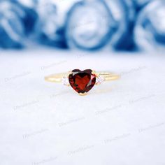 Heart Shaped Garnet Bridal Ring, Delicate Women CZ Diamond Stacking Ring, Promise Gift For Women, 14k Yellow Gold Personalized Jewelry The women's CZ diamond stacking ring is perfect for those seeking a promise gift that sparkles and shines. Make a statement with this 14k yellow gold personalized jewelry piece, a perfect gift for women who appreciate fine craftsmanship. Gemstone Details :- - Gemstone: Garnet - Stone Type: Lab Created - Shape: Heart Cut - Size:  6 MM - Color: Red - Luster: Excellent - Make: High Quality - Stone Type: Simulated Diamond - Shape: Round Cut - Size: 2.50 To 1.70 MM (Each Stone) - Color: Colorless - Luster: Excellent Types Of Gemstones :- - There is a wide selection of over 20 different gemstones to choose from :- - Blue Sapphire - Red Ruby - Green Emerald - Purp Heart Cut Ruby Ring In Yellow Gold For Wedding, Gold Birthstone Ring For Valentine's Day Proposal, Classic Heart-shaped Birthstone Wedding Ring, Heart Cut Dainty Birthstone Ring For Wedding, Dainty Heart Cut Birthstone Ring For Wedding, Anniversary Yellow Gold Heart Cut Birthstone Ring, 14k Gold Birthstone Ring For Valentine's Anniversary, 14k Gold Yellow Gold Birthstone Ring For Valentine's Day, 14k Gold Birthstone Ring For Anniversary On Valentine's Day