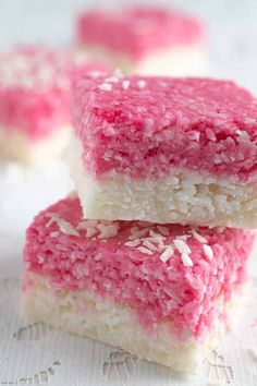 pink and white rice krispy treats stacked on top of each other