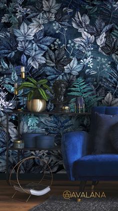 a blue chair sitting in front of a plant wallpaper