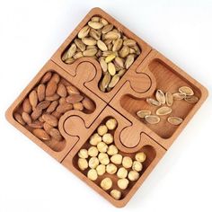 a wooden puzzle with nuts in it