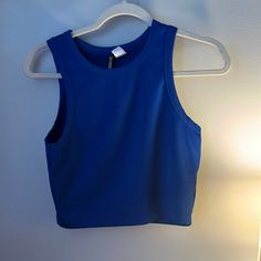 Dark Blue H&M Crop Top L Never Worn, Great Quality, Perfect Shape. Blue Summer Sports Top, Blue Sports Top For Summer, Blue Sleeveless Crop Top For Workout, Blue Sleeveless Workout Crop Top, Blue Sleeveless Sports Crop Top, Blue Sleeveless Crop Top For Sports, Blue Cropped Top For Workout, Sleeveless Blue Crop Top For Sports, Blue Cropped Workout Top