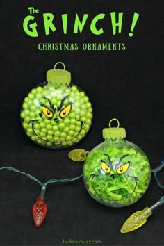 two christmas ornaments with grin faces on them and the caption reads, the grin christmas ornaments ornaments