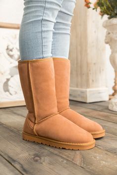 Stay warm in chic, eye-catching style when you pull on these genuine suede boots featuring a plush faux fur-lining. 1'' heel 11.5'' shaft 15.4'' circumference Pull-on Suede upper Faux fur lining Man-made sole Chestnut Cream, Yellow Turquoise, Shearling Boots, Ugg Classic, Eva Sole, Bearpaw Boots, Navy Color, Winter Style, Suede Boots