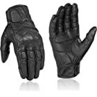 the black leather gloves are lined up on top of each other, with one hand in the