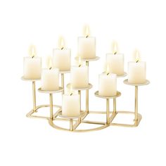 twelve white candles sitting on top of each other