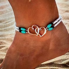 This elegant bohemian-style ankle set features delicate heart-shaped beads and a stretchy elastic design for a comfortable fit. Add a touch of romance and charm to any outfit with this versatile anklet set. Perfect for any occasion, it's an effortless way to elevate your style. Adjustable Heart Charm Anklets, Bohemian Heart Beads Bracelet For Beach, Bohemian Heart-shaped Beach Jewelry, Summer Festival Beaded Bracelets With Heart Beads, Elegant Bohemian, Jeans Bags, Beaded Anklet, Ankle Jewelry, Beadwork Patterns