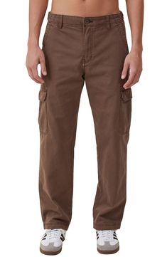 March to a utilitarian beat in these cargo pants cut from soft cotton and plenty of pockets for all your daily essentials. 32" inseam; 10 1/2" front rise Zip fly with button closure Front slant pockets; cargo flap-patch pockets; back flap-patch pockets 100% cotton Machine wash, line dry Imported Brown Cargo Pants With Side Pockets For Outdoor, Brown Cargo Pants With Multiple Pockets For Outdoor Activities, Brown Cotton Cargo Jeans With Pockets, Utility Cotton Cargo Pants For Outdoor Activities, Cotton Cargo Pants With Multiple Pockets For Outdoor Activities, Cotton Cargo Jeans With Multiple Pockets For Outdoor Activities, Cotton Cargo Jeans For Outdoor Activities, Cotton Cargo Pants With Side Pockets For Outdoor Activities, Brown Cotton Cargo Pants For Outdoor Activities