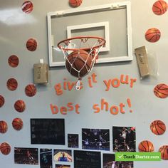 a basketball hoop hanging from the side of a wall with photos on it that say give it your best shot