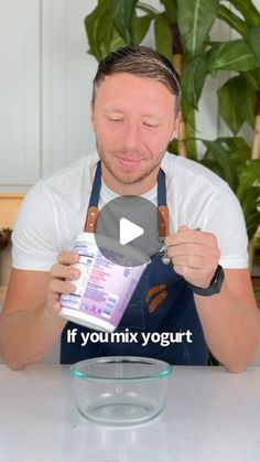 a man in an apron is making a video about how to use the yogurt