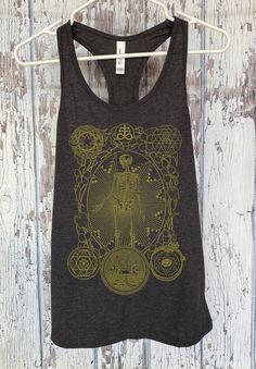 Alchemy has been many things since its incarnation, but at the heart of it all, it is the study and attraction to all magic, mysticism, and experimentation. Original design by Brad Stanfill, specializing in minimal and sacred geometry art. All designs are hand screen printed by us!Super soft lightweight preshrunk 100% cotton. Please check size chart for details!Follow us on Instagram and Tumblr for action shots of the apparel!@hexappealclothing Sacred Geometry Art, Action Shots, Skeleton Shirt, Geometry Art, Sparrows, Hand Screen Printed, Black Tank, White Tank, Sacred Geometry