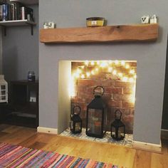 a living room filled with furniture and a fire place