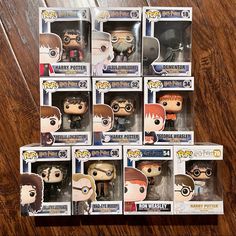 several harry potter pop - up figures are stacked on top of each other in boxes