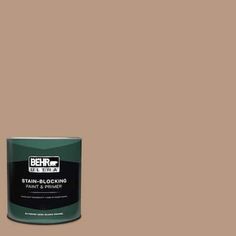 a can of behr paint on a brown background with the words, stain - blocking paint