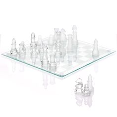 a glass chess board with pieces on it