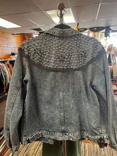 Silver fringe studded denim jacket. 100% cotton. One size. Trendy Studded Long Sleeve Outerwear, Trendy Long Sleeve Outerwear With Studs, Festival Long Sleeve Outerwear With Frayed Hem, Spring Long Sleeve Denim Jacket With Rivets, Trendy Studded Fall Outerwear, Fringe Cotton Denim Jacket For Fall, Fall Fringe Cotton Denim Jacket, Fall Cotton Denim Jacket With Fringe, Trendy Studded Outerwear For Fall