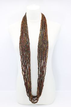 Description: 10-strand necklace Hand Painted 5mm x 6mm wooden beads Necklace Each necklace can be worn in different ways Length:Approximately 140 cmAvailable colours & Product codes:Red NL1966-H04Shades of Grey NL1966-H07Terecotta NL1966-H20Summer Beans NL1966-H57Autumn Beans NL1966-H58 Red Wooden Beaded Necklaces, Red Wooden Beaded Necklace, Elegant Multi-strand Necklace With Wooden Beads, Traditional Multi-strand Wooden Bead Necklaces, Multi-strand Necklace With Red Wooden Beads, Wooden Bead Necklaces, Beads Necklace, Strand Necklace, Wooden Beads