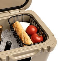 a cooler filled with food and drinks sitting on top of an ice pack bag next to a bottle