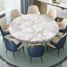 an oval marble dining table surrounded by blue chairs