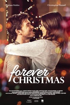 a movie poster for forever christmas with a man and woman hugging in front of a tree