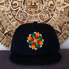 WIKIARI Cap. Huichol Handcrafted Cap "Nice stay" Unique and exclusive designs of WIKIARI, handmade by our Wixárika artisans. Available in: -Flat Cap (Snapback) -Curved Cap(Baseball Cap) SHIPPING INCLUDED!...  FREE SHIPPING! We are WIKIARI Wixárika Design a social company, 100% Mexican connected with Huichol art focused on the dissemination and design of unique pieces of Wixárika art in Mexico. We are WIKIARI Diseño Wixárika a social company, 100% Mexican connected with Huichol art focused on the spread and design of unique pieces of Wixárika art in Mexico. Traditional Black Handmade Hat, Traditional Handmade Black Hat, Black Handmade Hat, Traditional Handmade Cap Hat, Traditional Black Hat As Gift, Handmade Snapback Hat, Black Handmade Hat, One Size Fits Most, Handmade Black Hat One Size, Black Handmade Hat One Size Fits Most