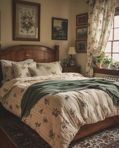 a bedroom with a bed, dresser and window